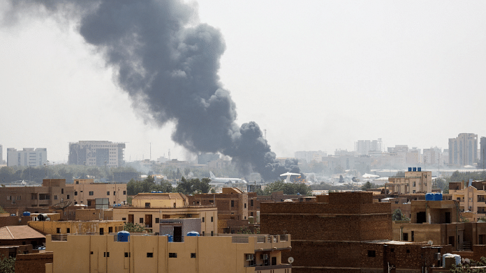 Smoke rises from burning aircraft inside Khartoum Airport during clashes between the paramilitary Rapid Support Forces and the army in Khartoum | Reuters