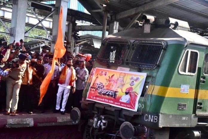Maharashtra CM Eknath Shinde flagging off Ayodhya train with Sena workers, in Thane | Photo: Twitter/@mieknathshinde