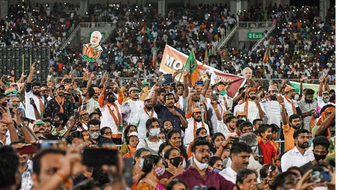 BJP supporters at an election campaign rally for the Kerala assembly polls on 2 April 2021 | PTI
