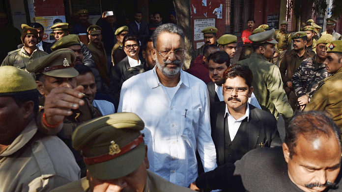 File photo of lawyer Vijay Mishra (wearing glasses) with gangster-turned-politician Mukhtar Ansari | ANI