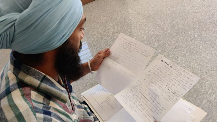 Gurbaj Singh with the documents from his migration attempts in the last nine years | Sonal Matharu | ThePrint