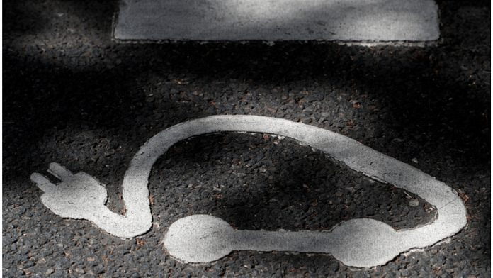 An Autolib' electric car-sharing logo is painted on the road in Paris, France | Reuters file photo