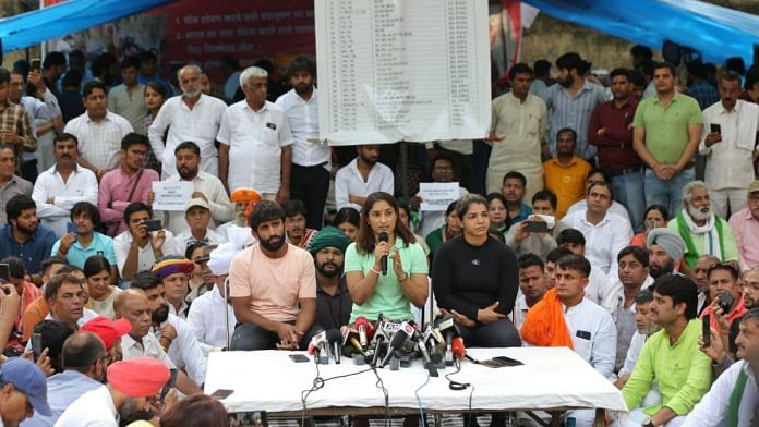 Wrestlers Bajrang Punia, Vinesh Phogat and Sakshi Malik address the media at Jantar Mantar | ThePrint photo by Suraj Singh Bisht