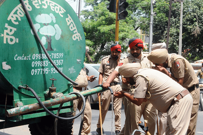 Like in the northern plains, summers in Punjab are scorching hot. Punjab policemen quench their thirst from a water tank in Patiala | ANI File Photo