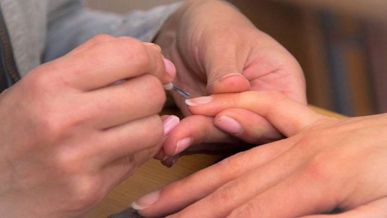 Give the mani-pedi-polish cycle a break. Your nails need to breathe