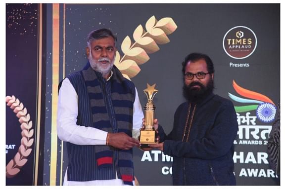 Best astrologer in India award received by union minister Prahalad Singh Patel of India
