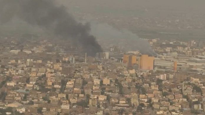 A drone view shows smoke rising over the Khartoum North Light Industrial Area, in Bahri, Sudan | Reuters