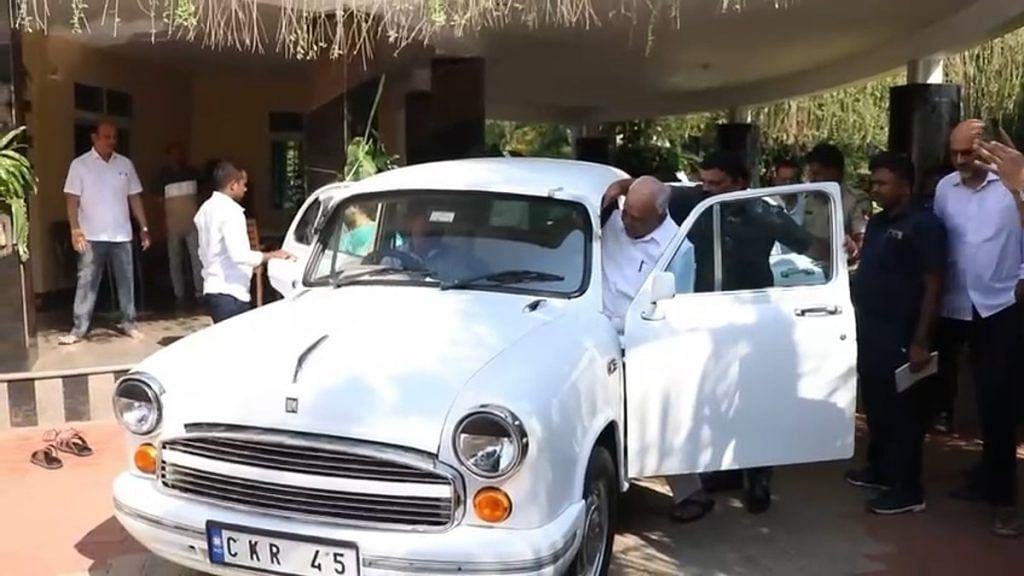 Former Karnataka CM B.S. Yediyurappa arrived in his white Ambassador car for his son B.Y. Vijayendra's filing of nominations for assembly polls | By special arrangement