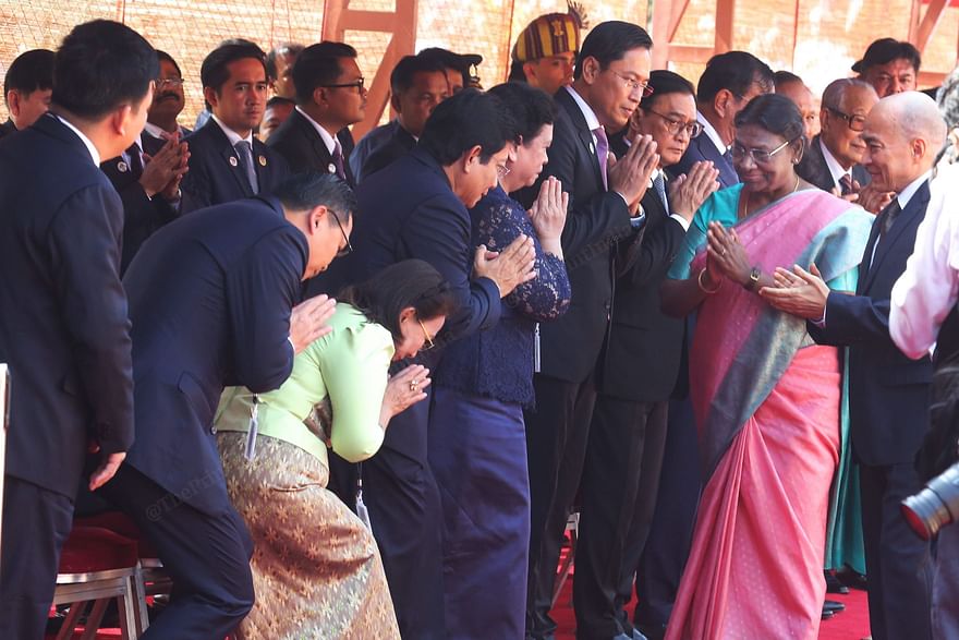 President Murmu greets the team from Cambodia along with PM Modi | Photo: Praveen Jain | ThePrint