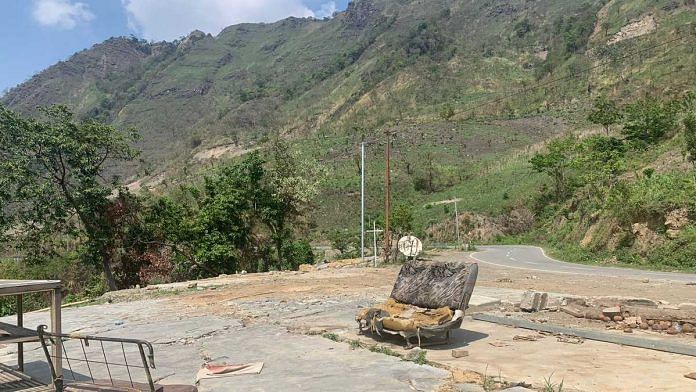 A dilapidated chair is one of the few remnants of K. Songjang village, which once stood on the edge of Old Cachar Road, under Henglep sub-division of Churachandpur district | Karishma Hasnat | ThePrint