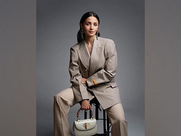 Alia Bhatt pairs her denim-on-denim look with a Gucci bag