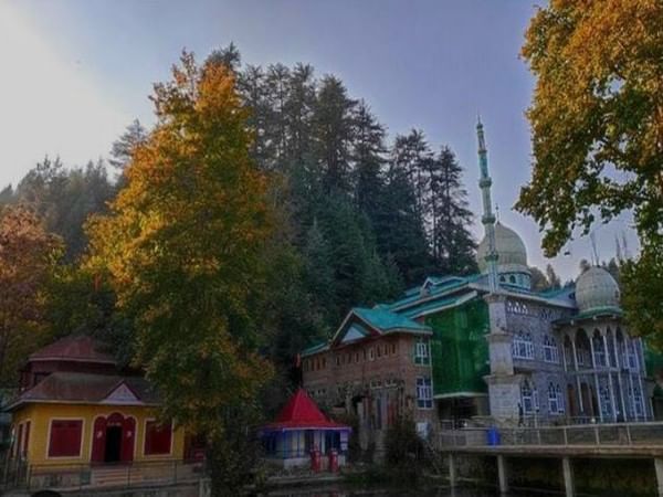 Unity in diversity: Grand mosque and Hindu temple share common yard in Kashmir's Trehgam village