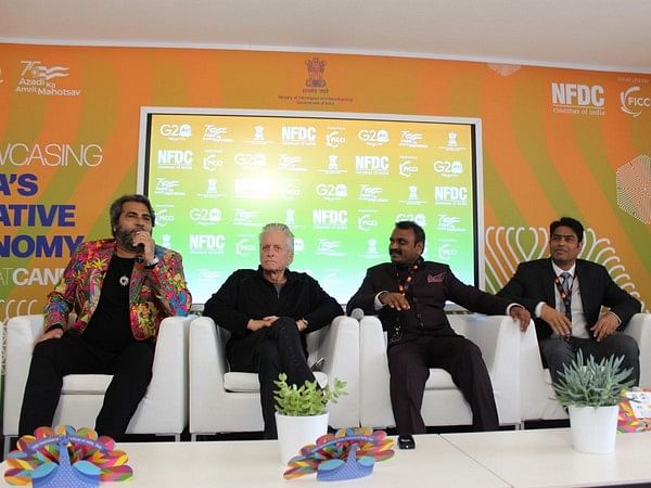 Michael Douglas and Shailendra Singh visit the Indian Pavilion at Cannes to meet Minister Dr. L. Murugan