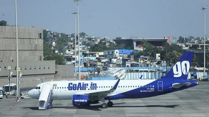 A Go First airline, formerly known as GoAir, passenger aircraft is parked at the Chhatrapati Shivaji International Airport in Mumbai | File Photo: Reuters