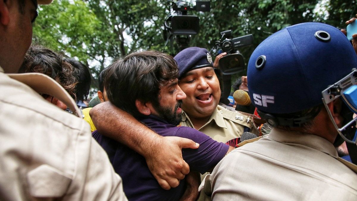 Bajrang Punia being taken away by the police Sunday | Manisha Mondal | ThePrint