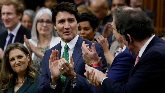 Canada's Prime Minister Justin Trudeau applauds as Canada's Deputy Prime Minister and Minister of Finance Chrystia Freeland presents the federal government budget for fiscal year 2023-24 in the House of Commons on Parliament Hill in Ottawa, Ontario on 28 March, 2023 | Reuters
