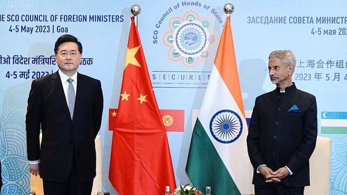 India's Foreign Minister Subrahmanyam Jaishankar and his Chinese counterpart Qin Gang pose for a photograph during the SCO Council of Foreign Ministers' meeting in Goa on 4 May, 2023 | Reuters