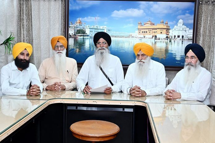 SGPC president Harjinder Singh Dhami (centre) addressing a press conference in Amritsar Tuesday | Photo: By special arrangement