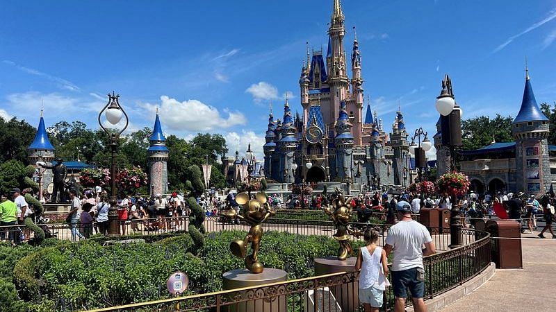 People gather ahead of the "Festival of Fantasy" parade at the Walt Disney World Magic Kingdom theme park in Orlando, Florida | File Photo: Reuters