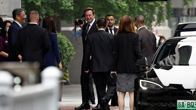 Tesla CEO Elon Musk showered with praise, feasts during China trip