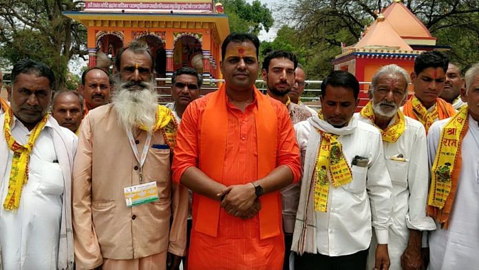 Head of Congress' priest cell, Sudhir Bharti (centre) along with priests from Shajapur district, Madhya Pradesh | Photo: Shubhangi Misra, ThePrint