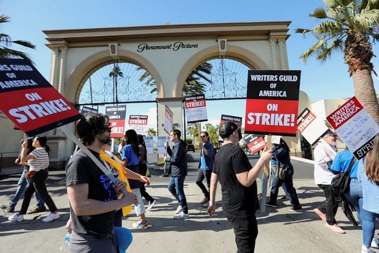 Striking writers get Hollywood unions’ support as TV production slows