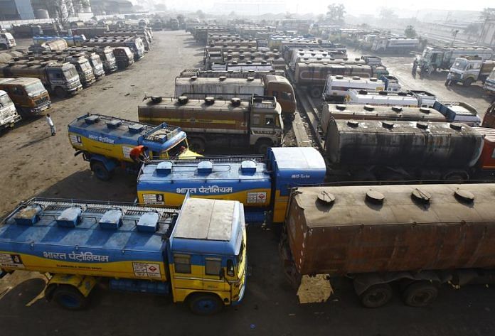 Oil tankers are seen parked at a yard outside a fuel depot on the outskirts of Kolkata | Reuters file photo