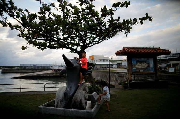 Children play on Japan's westernmost inhabited Yonaguni Island in Yonaguni, Okinawa prefecture, Japan | Photo: Reuters File