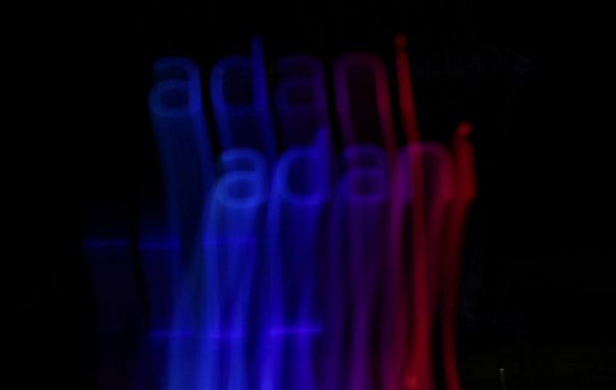 The logo of the Adani Group is seen on a building, in Mumbai | Reuters