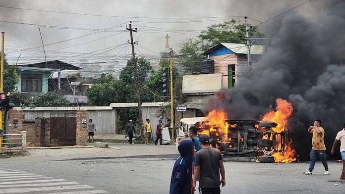 A vehicle set on fire in Imphal | Karishma Hasnat | ThePrint