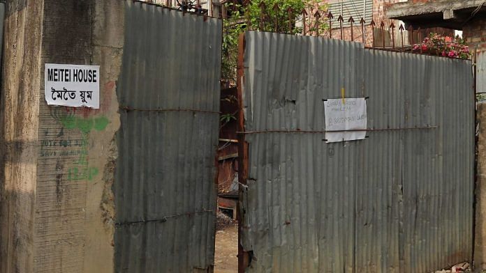 In Imphal, these days, one often comes across the word “Meitei” — typed on paper in English and Bengali script — pasted on the gates of houses that flank Kuki-dominated colonies, to keep potential attackers away | Suraj Singh Bisht | ThePrint
