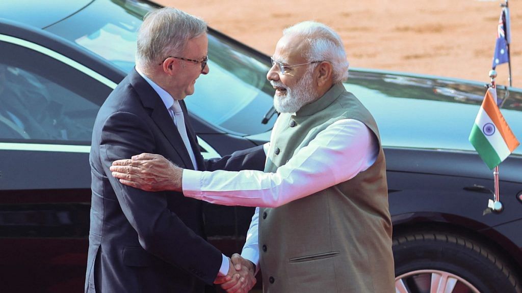 Australian Prime Minister Anthony Albanese shakes hands with PM Narendra Modi | Reuters file photo/Altaf Hussain