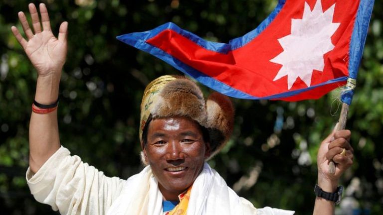 Nepali sherpa scales Mount Everest for 27th time, beats his own record