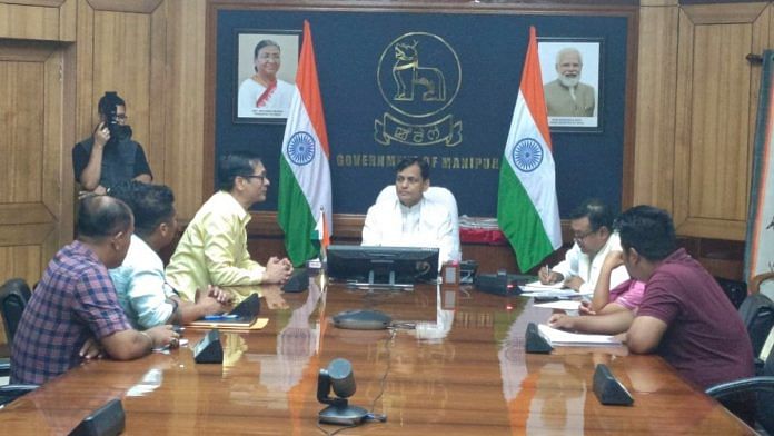Union minister Nityanand Rai & BJP's Sambit Patra meeting officials in Imphal Friday | Twitter @nityanandraibjp