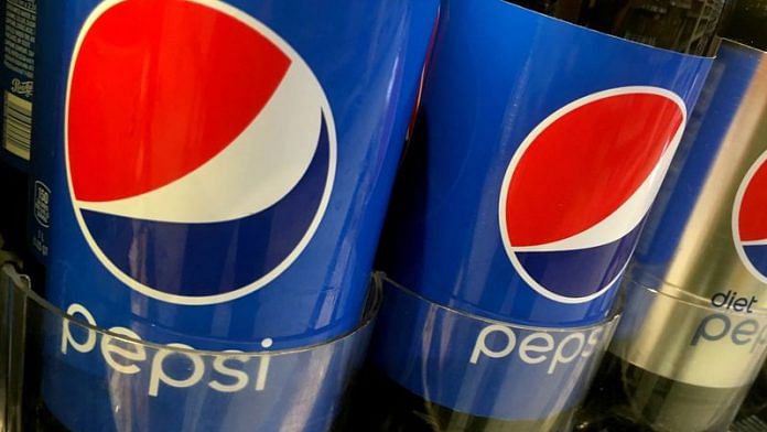 Pepsi bottles are seen lined up at a store in New York | File Photo: Reuters