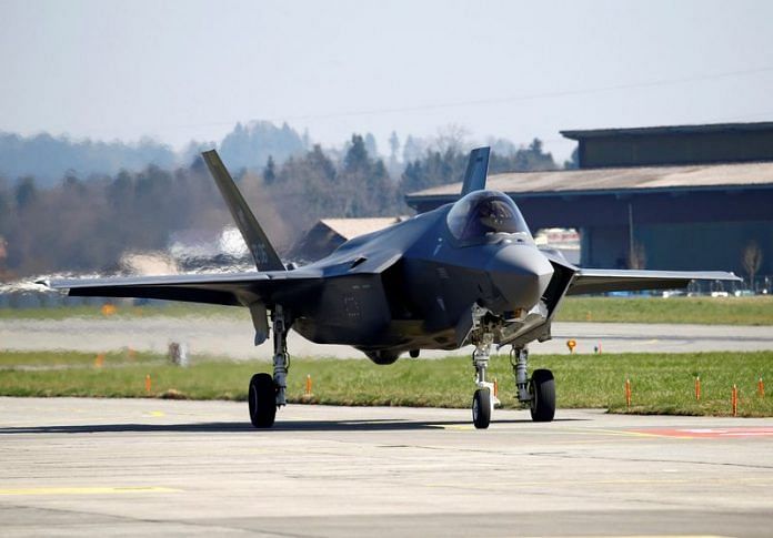 A F-35A fighter aircraft rolls on a tarmac during a presentation at the Swiss Air Force base in Emmen, Switzerland 23 March 2022