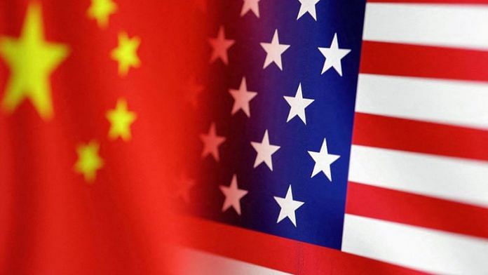 U.S. and Chinese flags are seen in this illustration | File Photo: Reuters