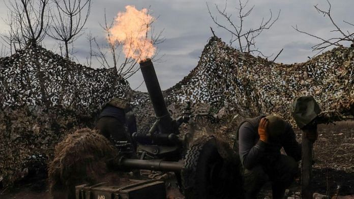 Ukrainian service members fire a mortar towards Russian troops outside the frontline town of Bakhmut | File Photo: Reuters