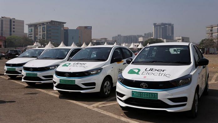 Uber electric taxis are seen outside a charging station in Mumbai | File Photo: Reuters