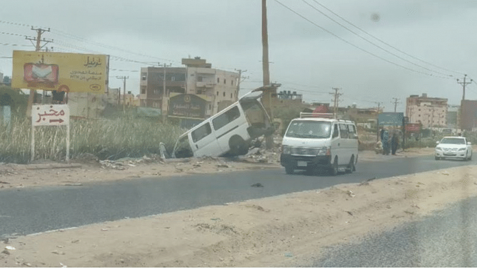 A view shows a damaged car at Martyr Muhammad Hashem Matar Street in Bahri, Khartoum North, Sudan, April 30, 2023, in this still image taken from video obtained by Reuters
