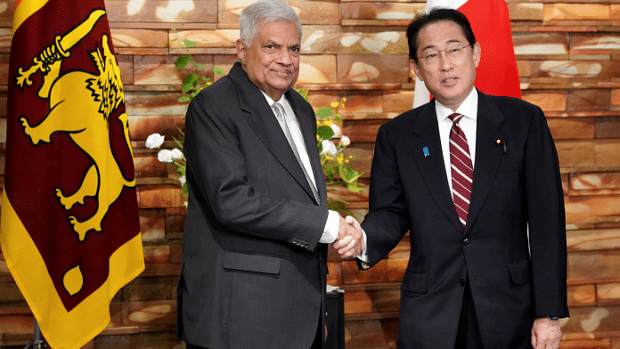 Sri Lankan president Ranil Wickremesinghe and Japanese PM Fumio Kishida shake hands before their meeting in Tokyo, on 25 May 2023 | Eugene Hoshiko/Pool via Reuters