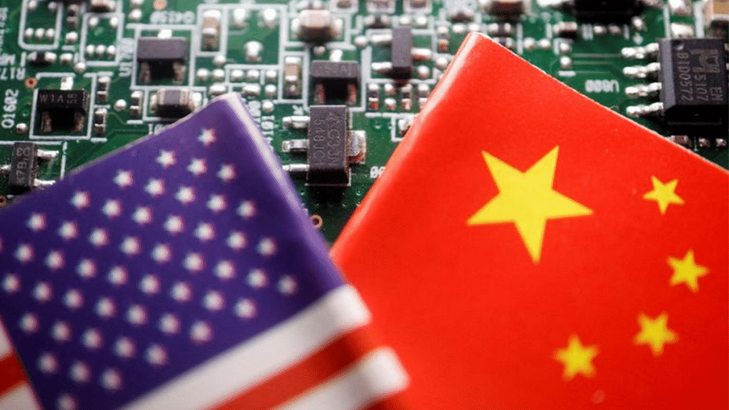 Flags of China and US are displayed on a printed circuit board with semiconductor chips | Illustration: Reuters
