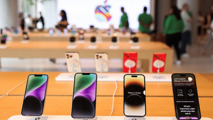 Apple iPhones are seen inside India's first Apple retail store during a media preview, a day ahead of its launch in Mumbai on 17 April, 2023 | Reuters