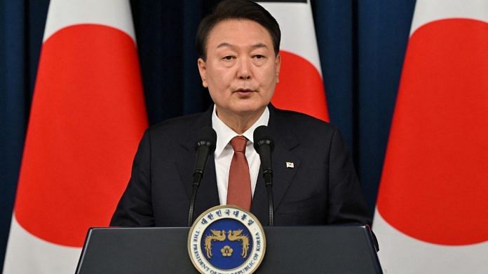 South Korean President Yoon Suk Yeol speaks during a joint press conference with Japanese Prime Minister Fumio Kishida after their meeting at the presidential office in Seoul on 7 May | Jung Yeon-je/via Reuters