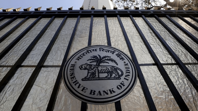 Caption: The Reserve Bank of India (RBI) seal is pictured on a gate outside the RBI headquarters in Mumbai | Reuters file photo/Danish Siddiqui