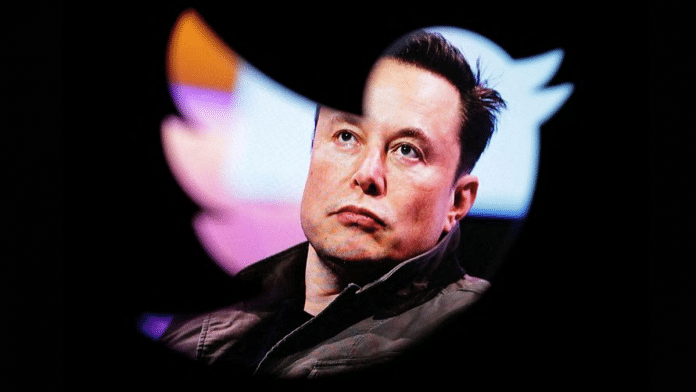 Elon Musk's photo is seen through a Twitter logo | Illustration by Dado Ruvic/Reuters