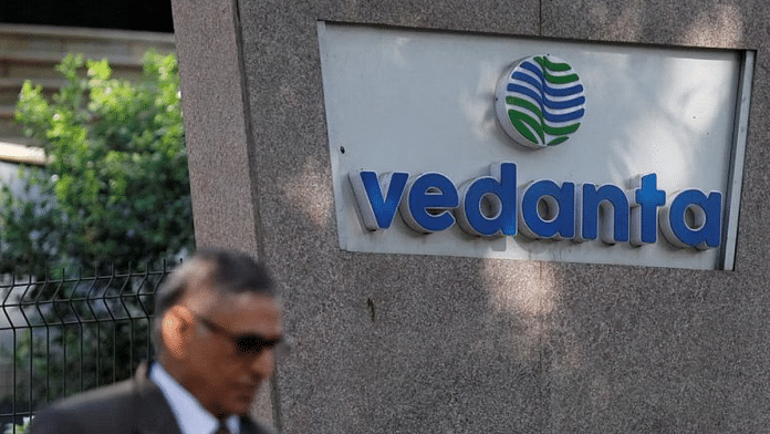 A man walks past the logo of Vedanta outside its headquarters in Mumbai | Reuters/Danish Siddiqui