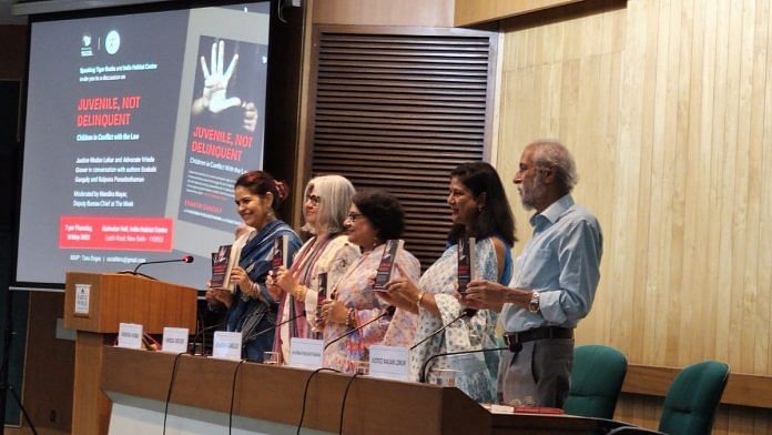 Enakshi Ganguly, Kalpana Purushothaman, Vrinda Grover and Justice Madan Lokur pose with a copy of ‘Juvenile, Not Delinquent: Children in Conflict with the Law’ at Delhi’s IHC | Photo: Raghav Bikhchandani