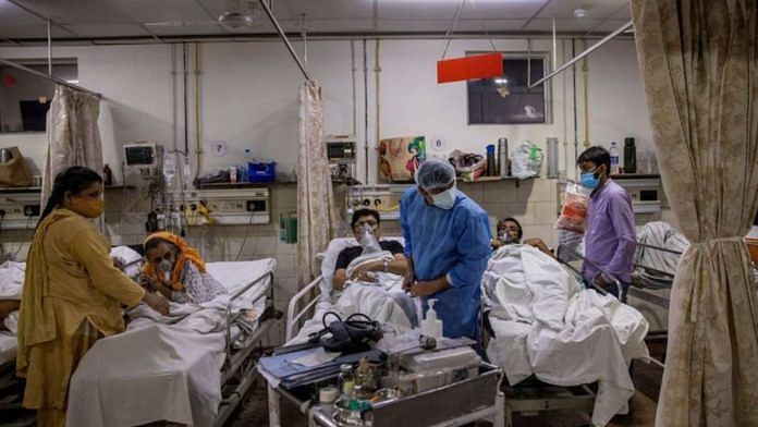 Patients getting treated by a doctor in a hospital ward | (c) Copyright Thomson Reuters 2023
