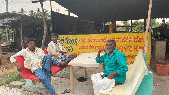 Local residents take a break to escape the afternoon sun in Congress state president D.K.Shivakumar's constituency Kanakapura | Shanker Arnimesh | ThePrint